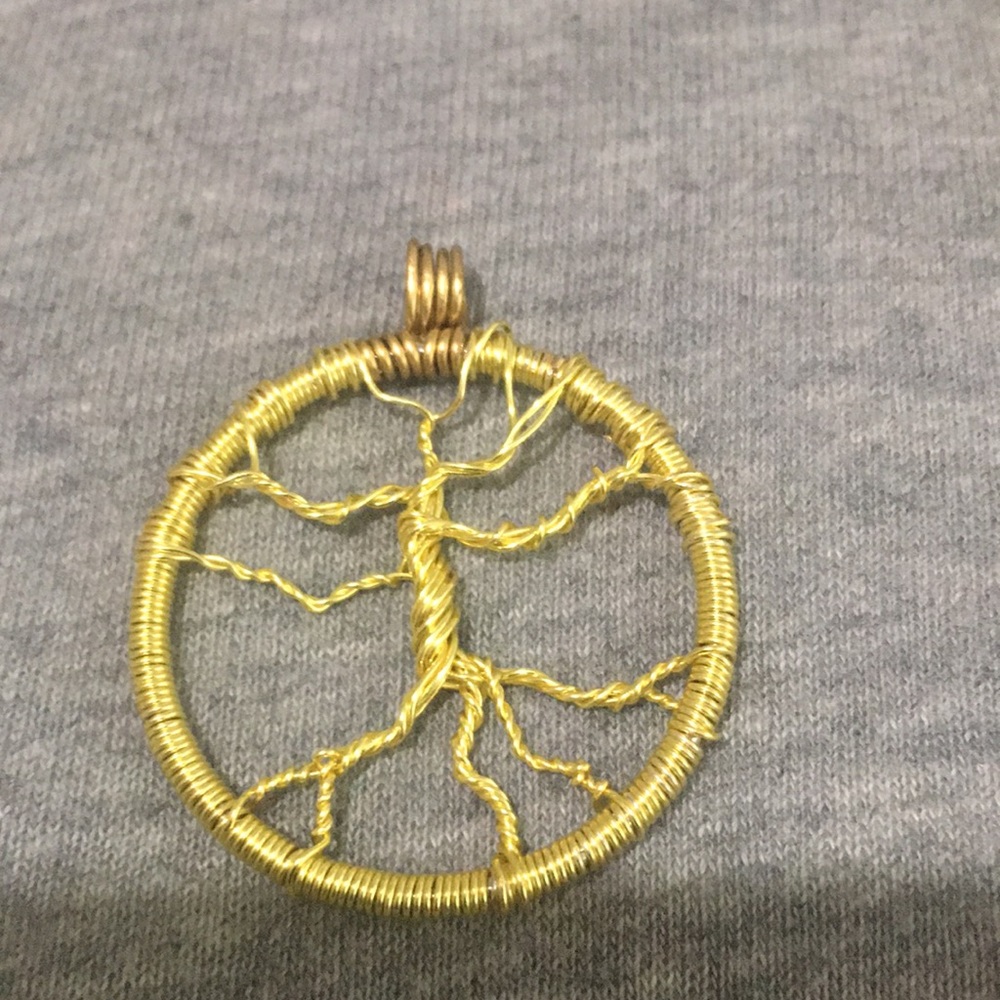 Handcrafted infinity tree pendant